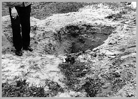 Holes dug by Poles searching for valuables  in the area of the former death camp